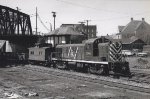 CNJ 1546 and trailing caboose start the workday of a new week